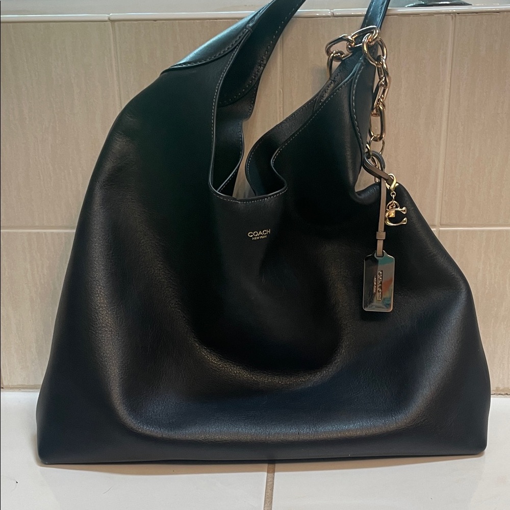 Coach Black Leather Hobo Bag with Gold Accents